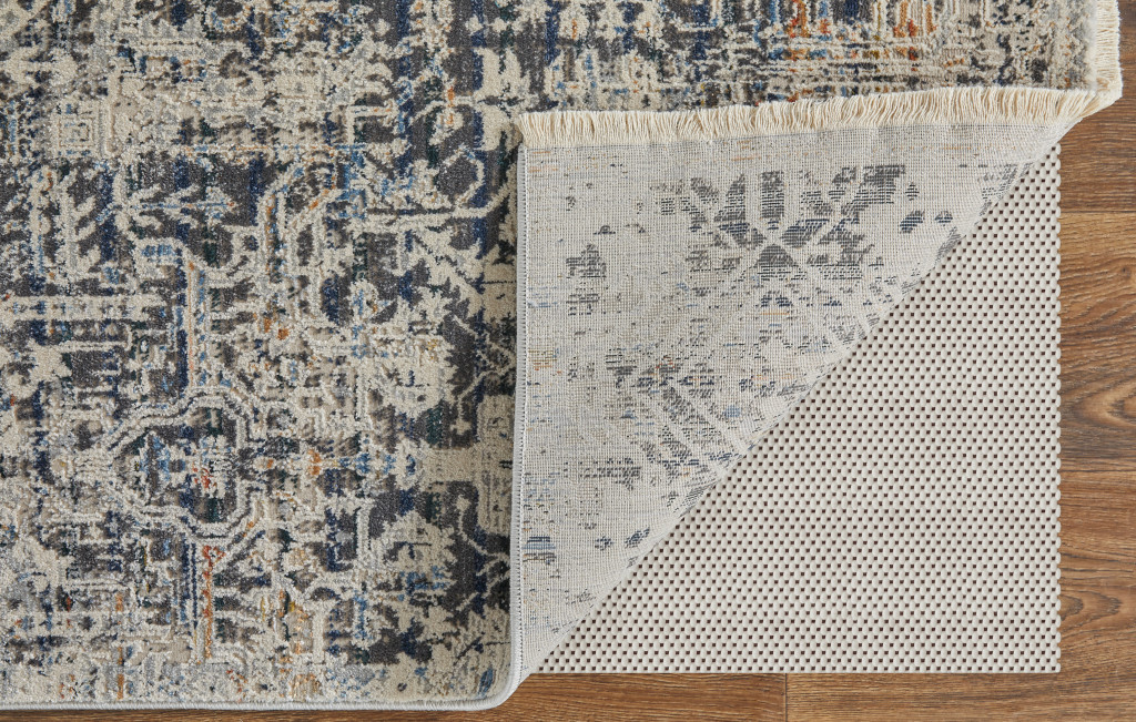 3" X 5" Ivory and Gray Abstract Power Loom Worn Faded Area Rug With Fringe