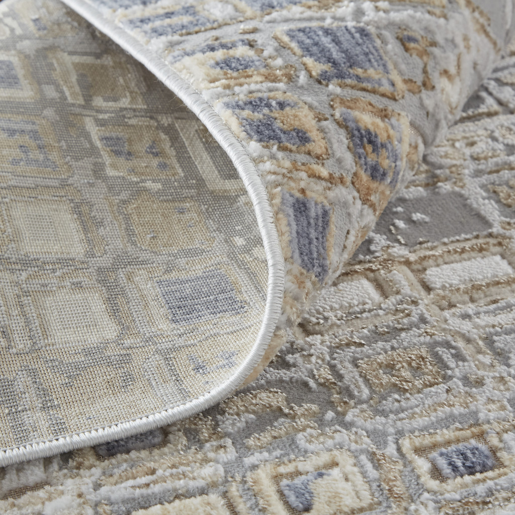 3" X 5" Tan Ivory and Blue Geometric Power Loom Worn Faded Area Rug