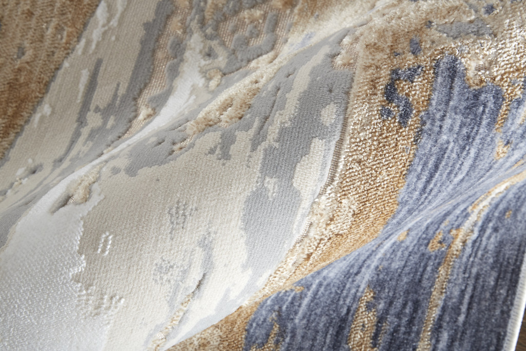3" X 5" Tan Ivory and Blue Abstract Power Loom Worn Faded Area Rug