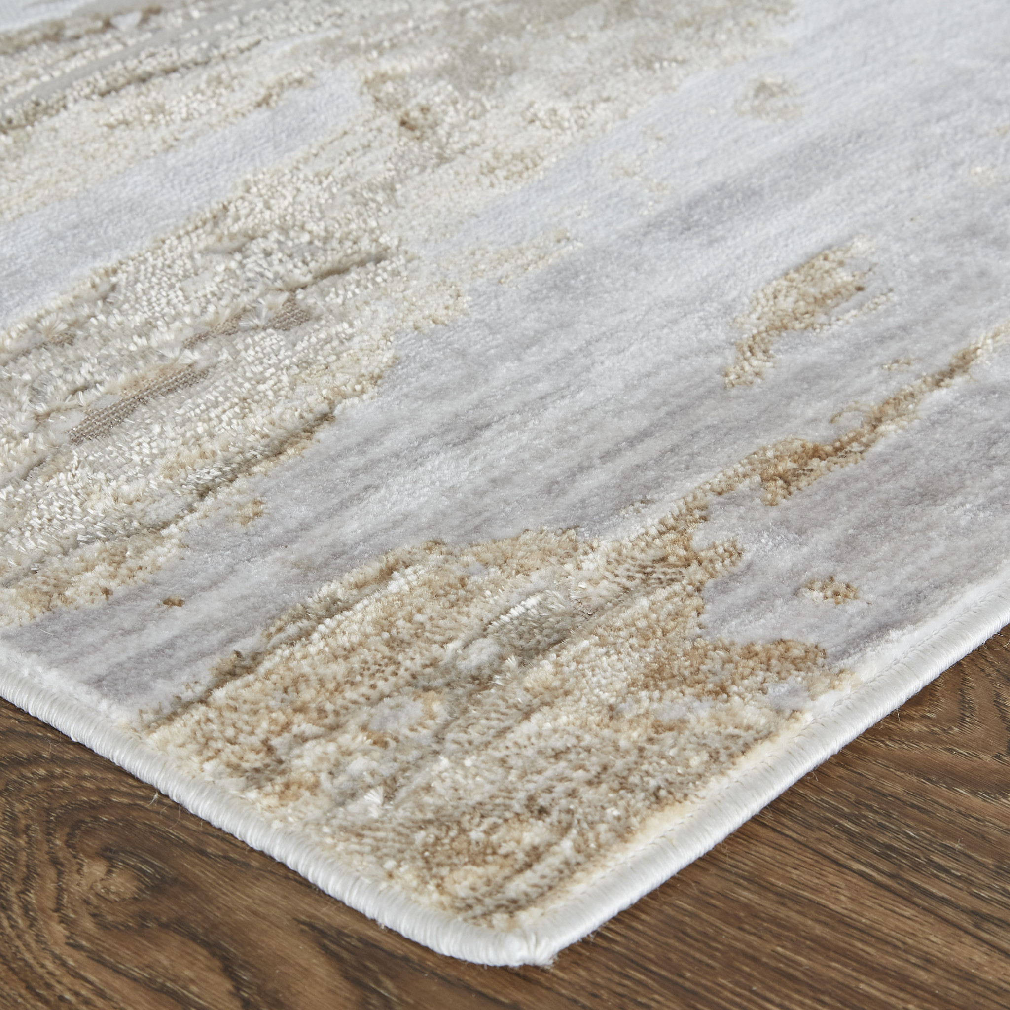 3" X 5" Ivory Gray and Tan Abstract Power Loom Worn Faded Area Rug