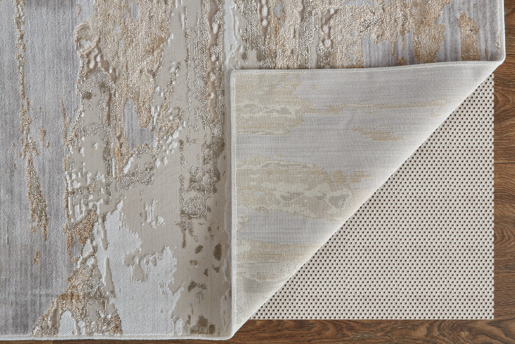 3" X 5" Ivory Gray and Tan Abstract Power Loom Worn Faded Area Rug