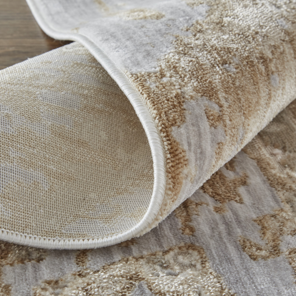3" X 5" Ivory Gray and Tan Abstract Power Loom Worn Faded Area Rug