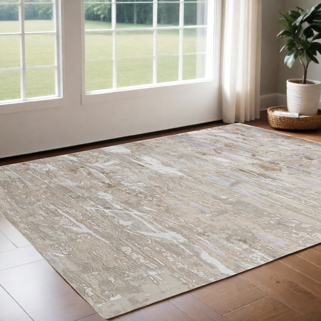 3" X 5" Ivory Gray and Tan Abstract Power Loom Worn Faded Area Rug