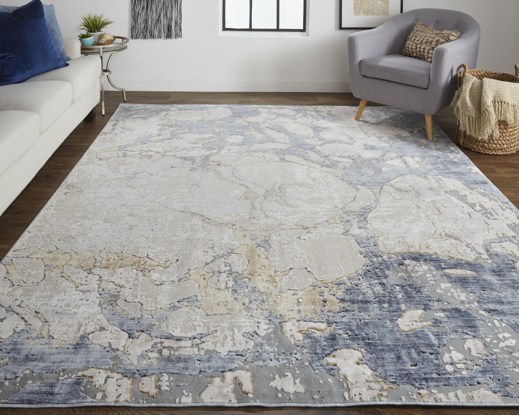 3" X 5" Tan and Blue Abstract Power Loom Worn Faded Area Rug