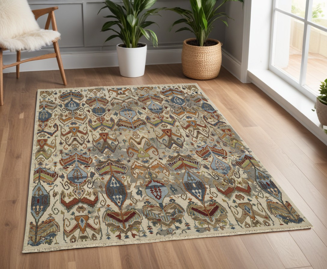 4' X 6' Ivory Blue and Brown Wool Ikat Hand Knotted Area Rug With Fringe-567347-1