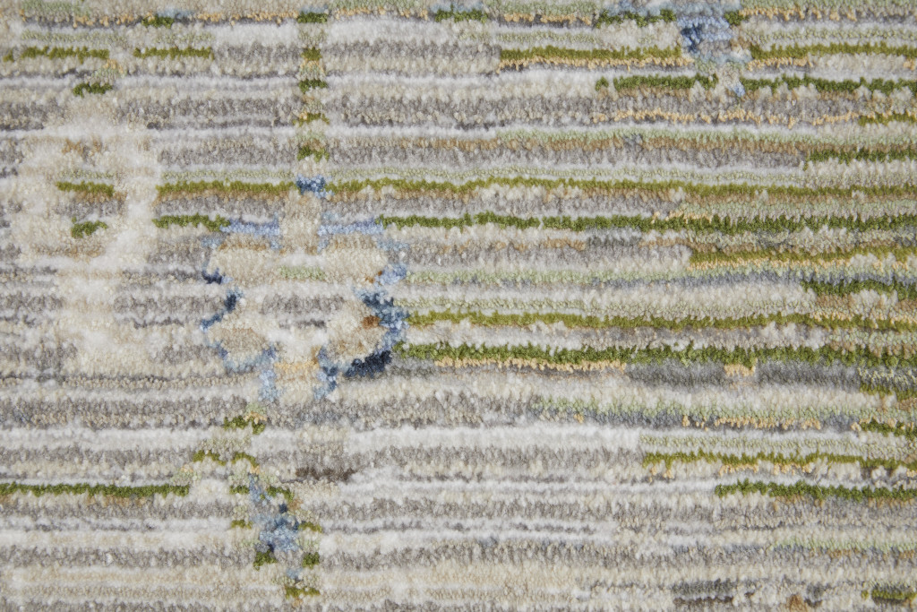 9" X 13" Ivory Green and Blue Abstract Power Loom Worn Faded Area Rug