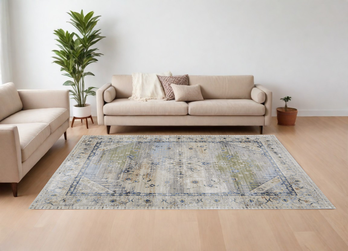 9" X 13" Ivory Green and Blue Abstract Power Loom Worn Faded Area Rug