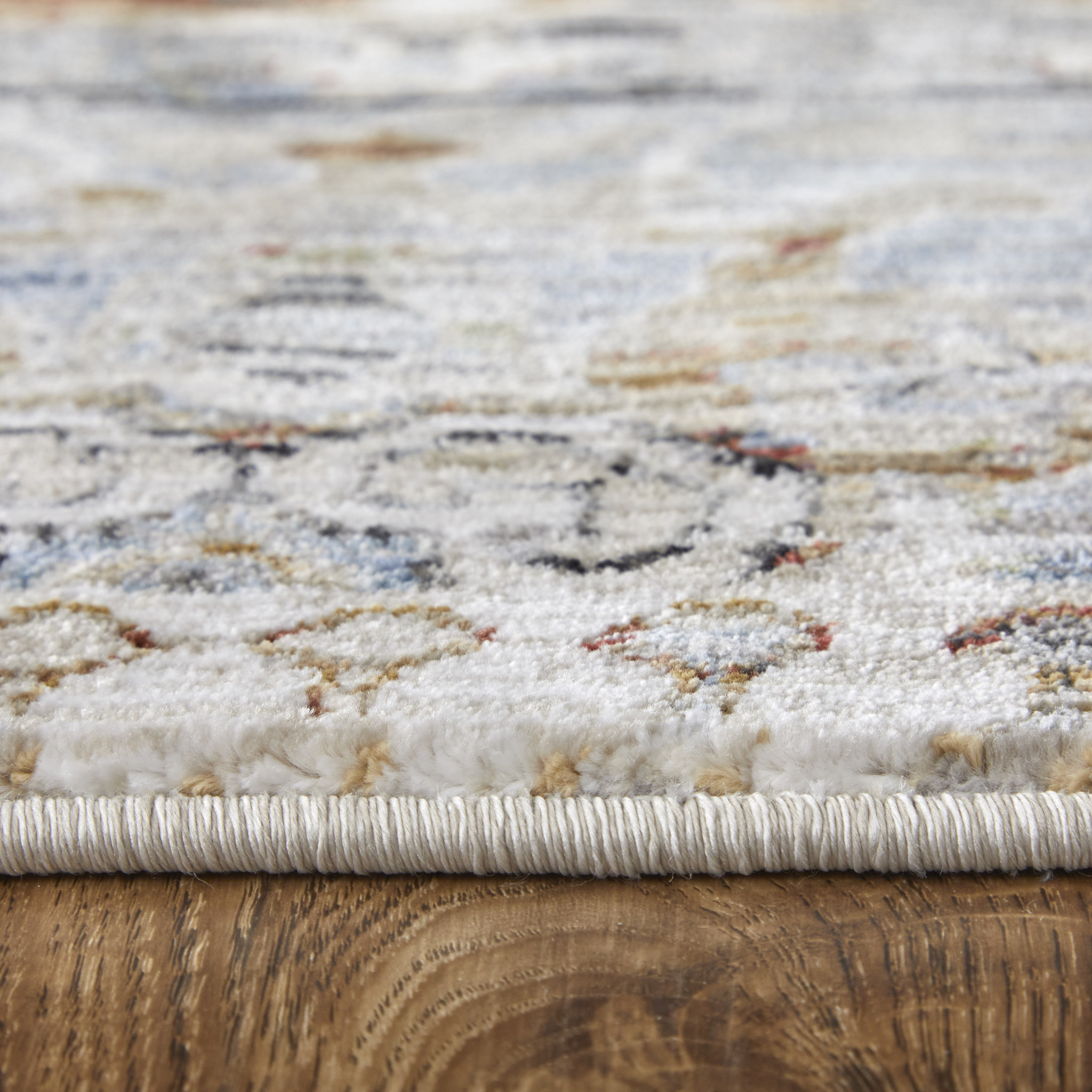 2" X 3" Ivory Red and Blue Abstract Power Loom Worn Faded Area Rug