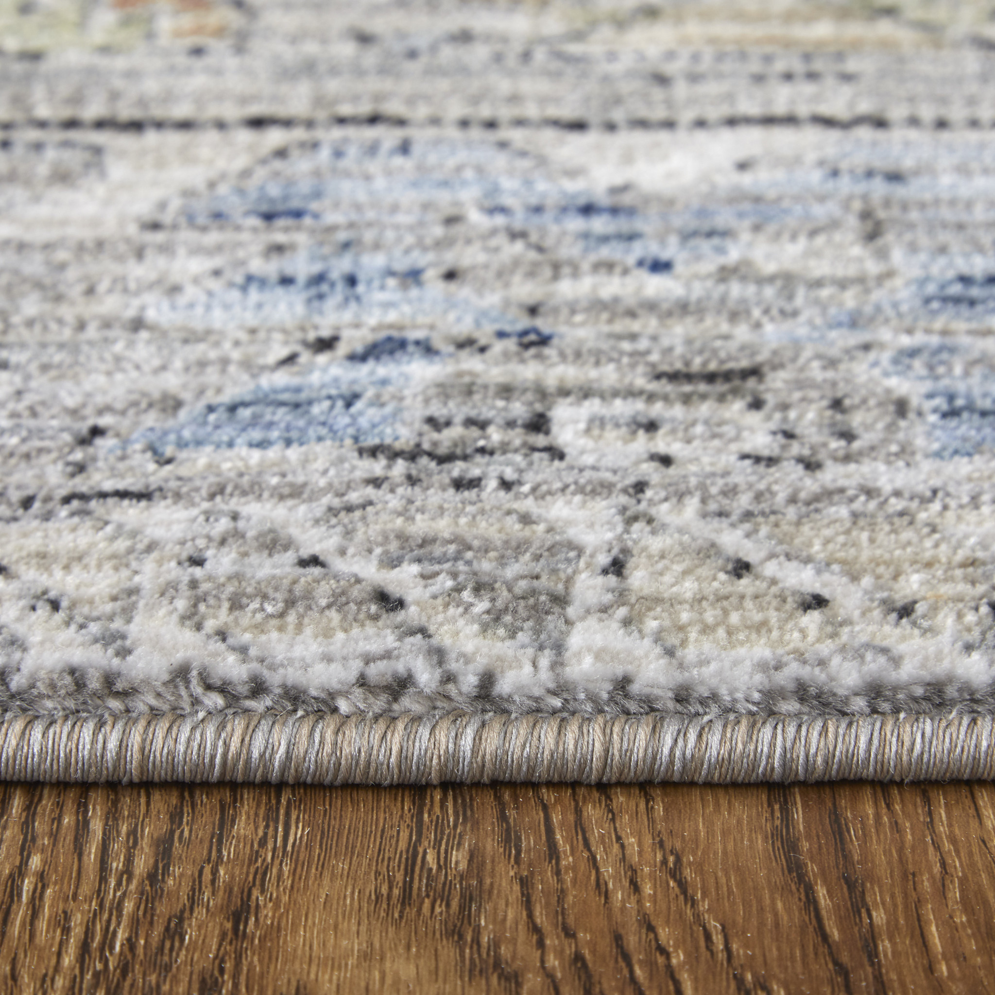 2" X 3" Gray Blue and Red Abstract Power Loom Worn Faded Area Rug