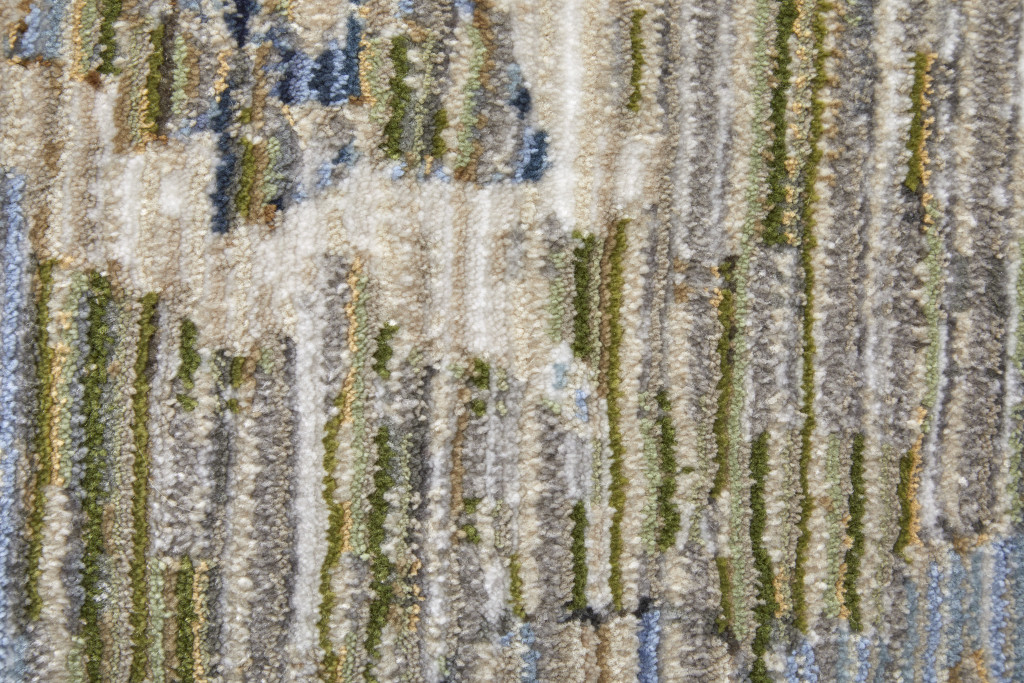 9" X 13" Ivory Green and Blue Floral Power Loom Worn Faded Area Rug