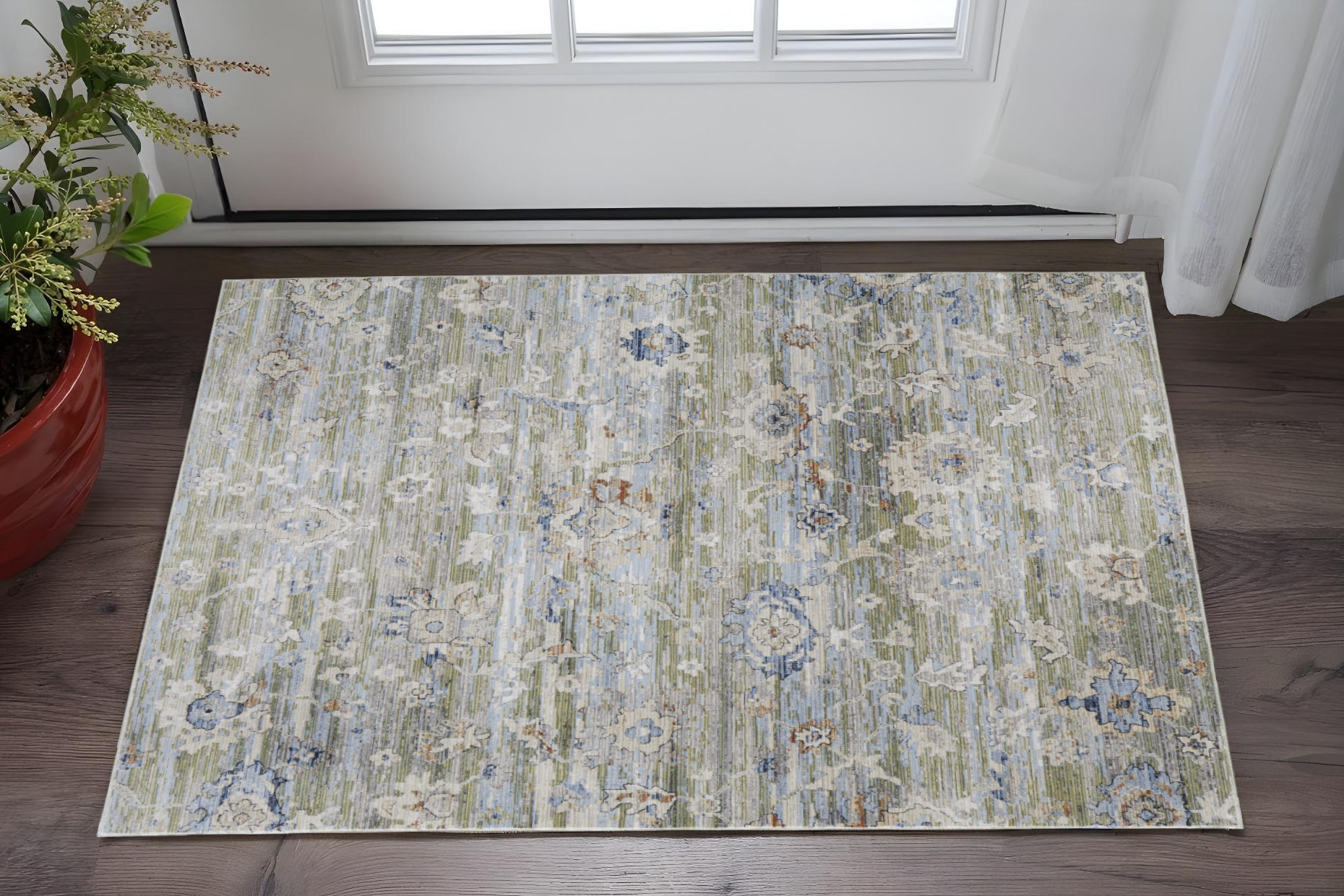 2" X 3" Ivory Green and Blue Floral Power Loom Worn Faded Area Rug