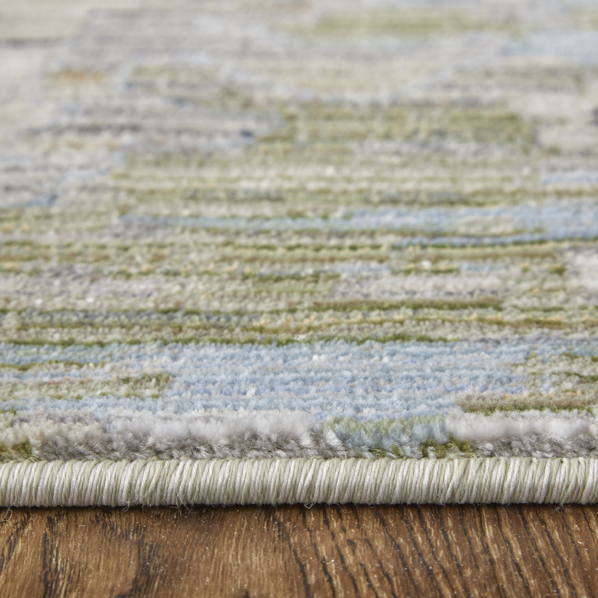 2" X 3" Ivory Green and Blue Floral Power Loom Worn Faded Area Rug