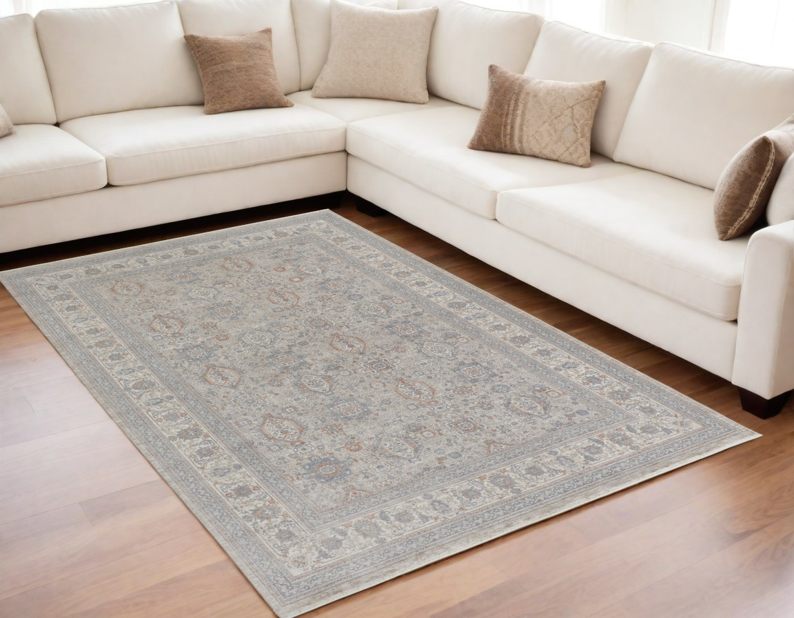 5" X 7" Silver Taupe and Blue Oriental Power Loom Worn Faded Area Rug With Fringe