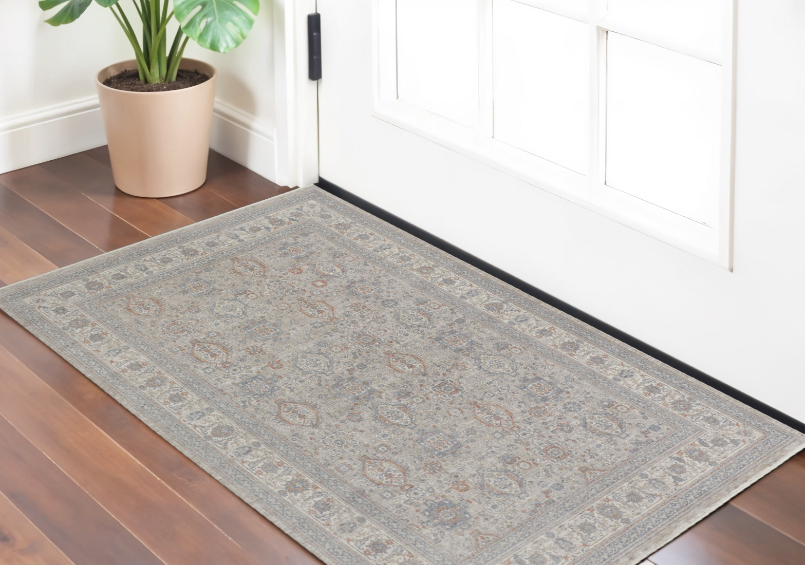 2" X 3" Silver Taupe and Blue Oriental Power Loom Worn Faded Area Rug With Fringe