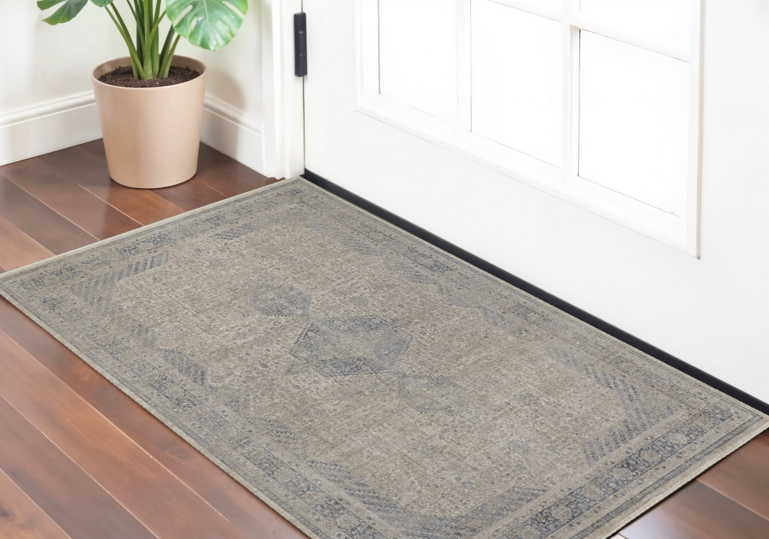 2" X 3" Gray Blue and Taupe Oriental Power Loom Worn Faded Area Rug With Fringe