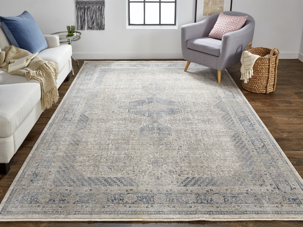 2" X 3" Gray Blue and Taupe Oriental Power Loom Worn Faded Area Rug With Fringe