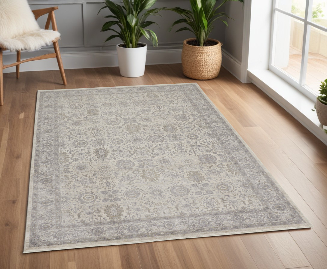 4" X 5" Gray and Ivory Oriental Power Loom Worn Faded Area Rug With Fringe