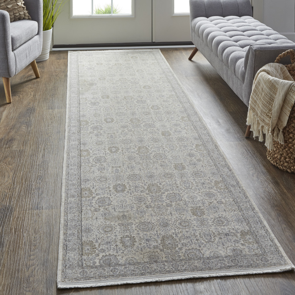 8" Gray and Ivory Oriental Power Loom Worn Faded Runner Rug With Fringe
