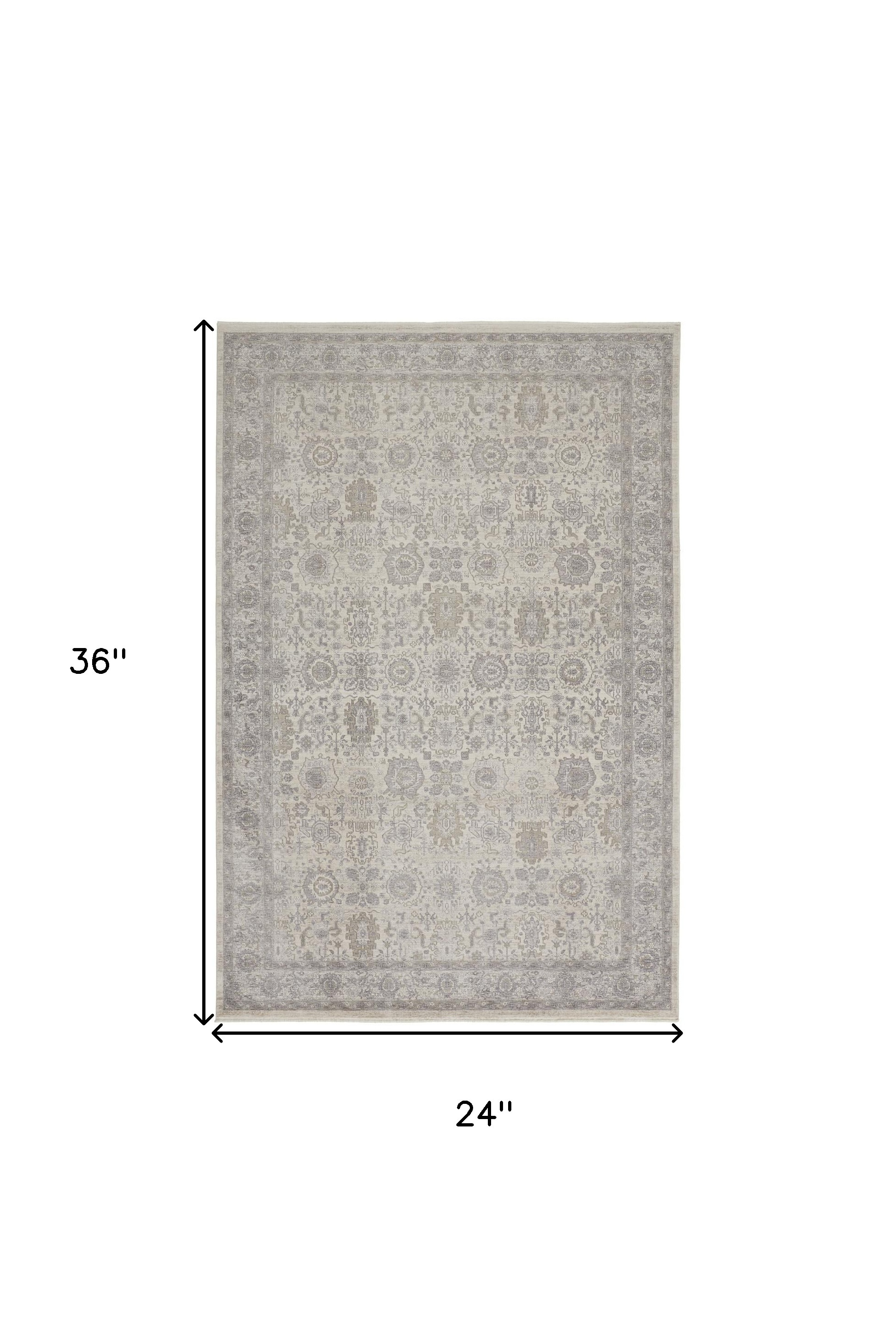 2" X 3" Gray and Ivory Oriental Power Loom Worn Faded Area Rug With Fringe