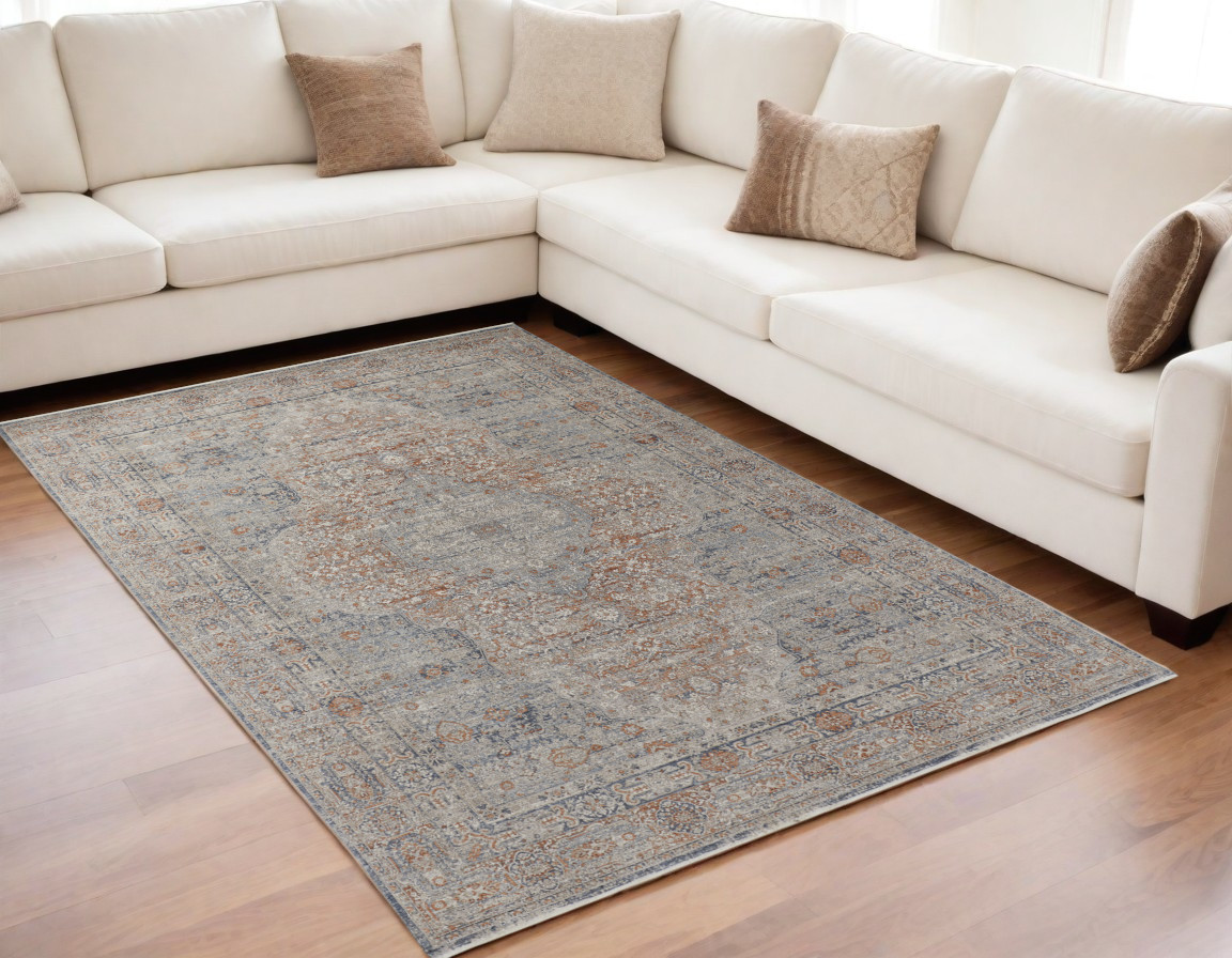 5' X 7' Gray Ivory and Orange Oriental Power Loom Worn Faded Area Rug With Fringe-567471-1