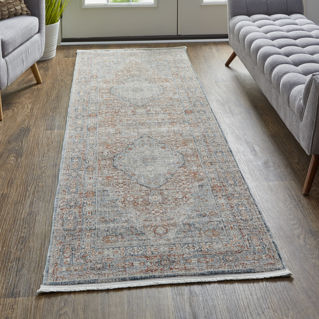 12" Gray Ivory and Orange Oriental Power Loom Worn Faded Runner Rug With Fringe