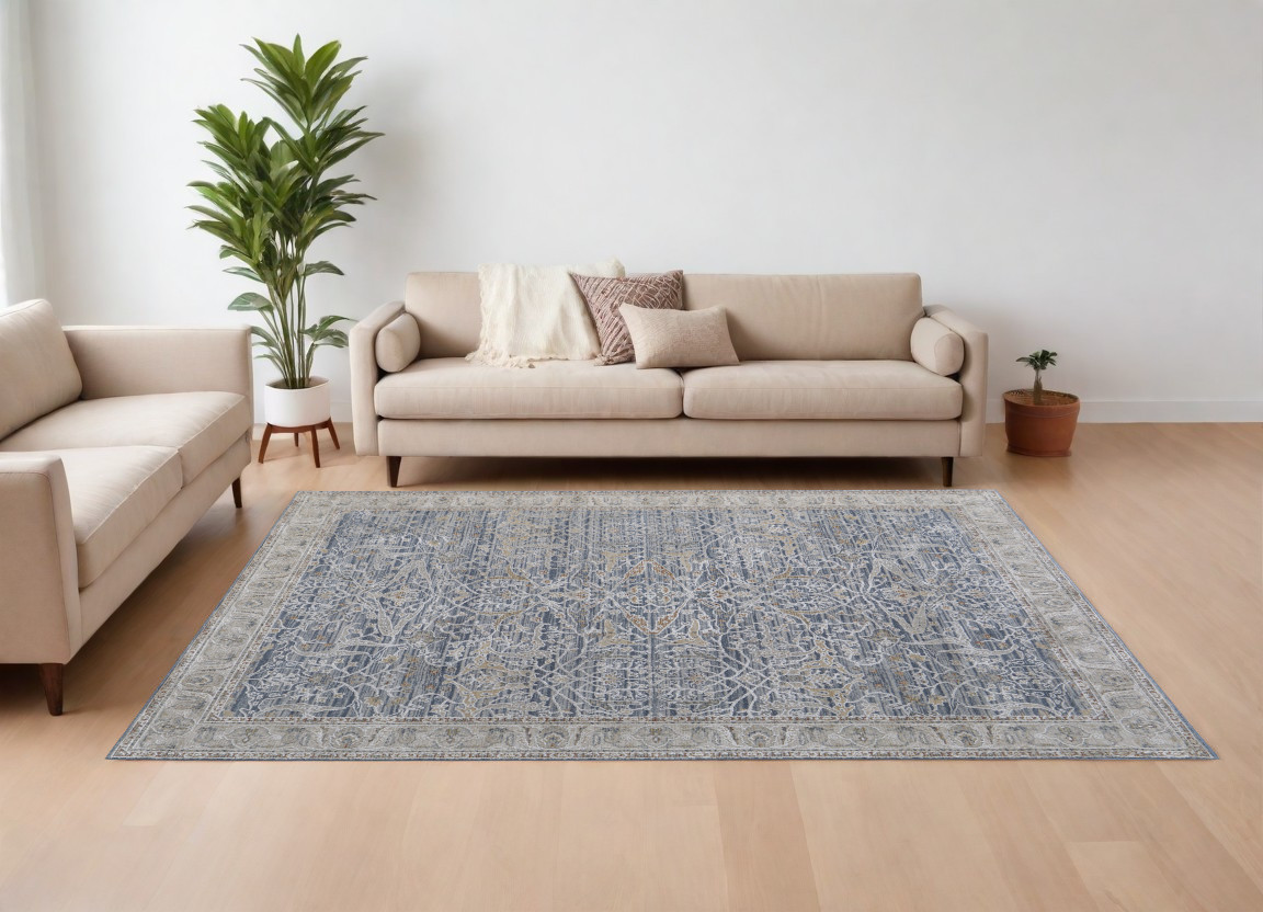 9" X 13" Taupe and Blue Ikat Power Loom Worn Faded Area Rug With Fringe