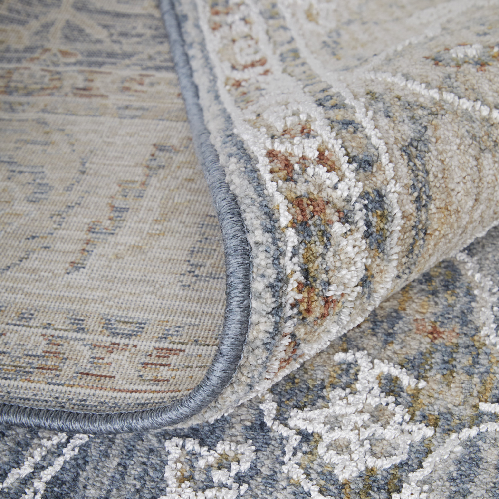2" X 3" Taupe and Blue Ikat Power Loom Worn Faded Area Rug With Fringe