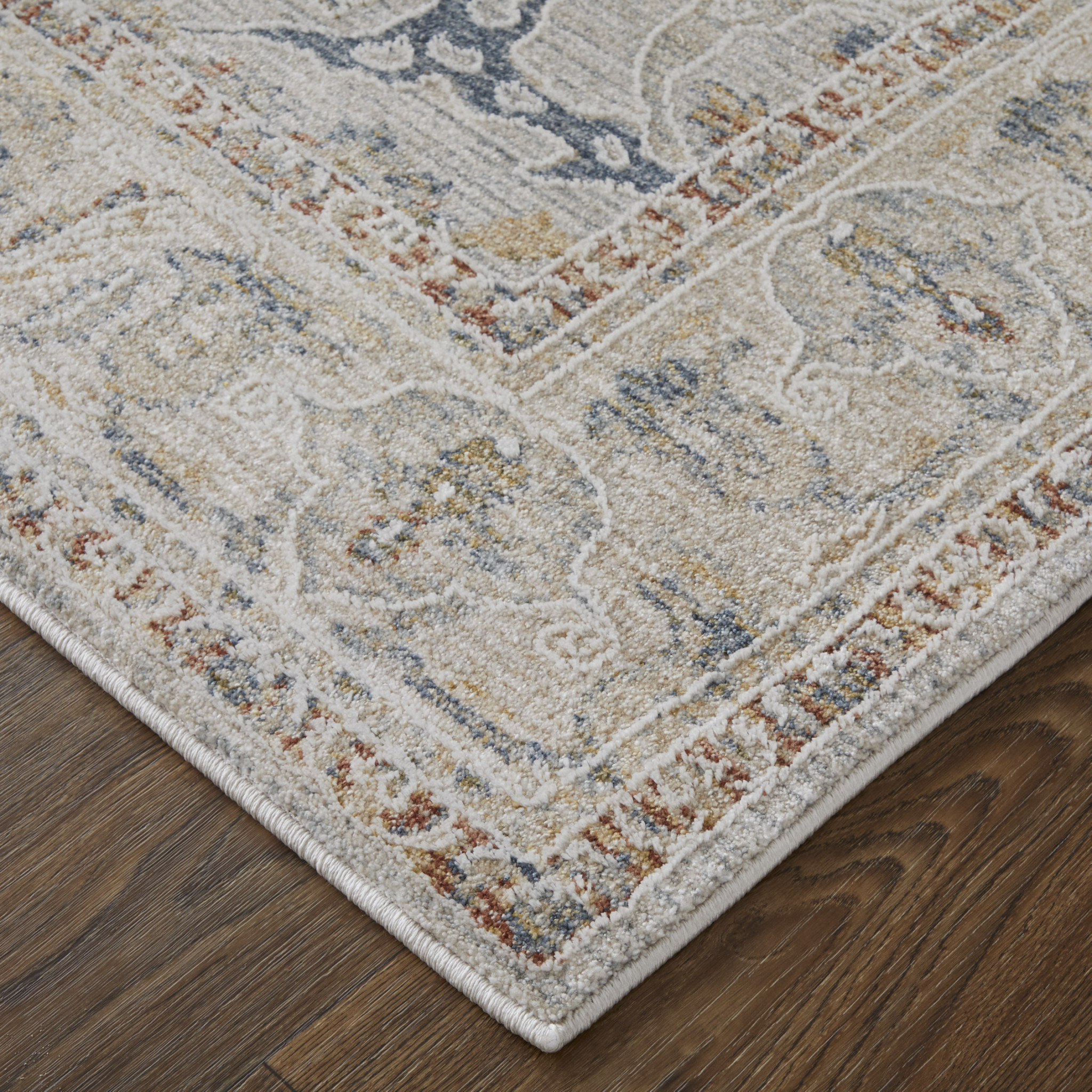 2" X 3" Ivory Taupe and Blue Ikat Power Loom Worn Faded Area Rug With Fringe