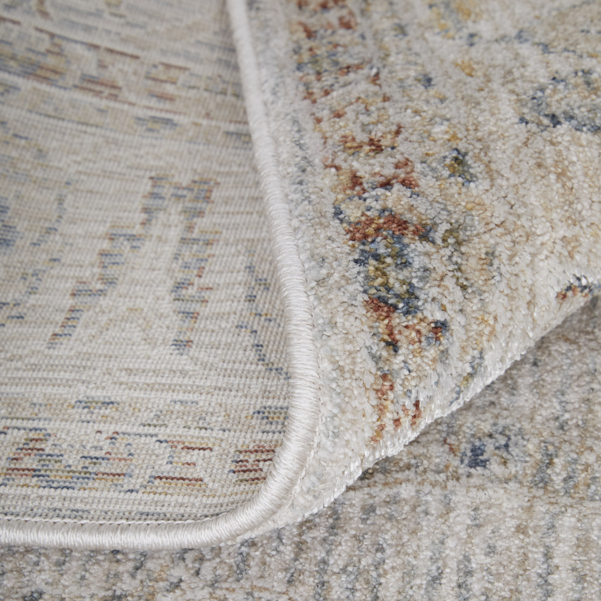 2" X 3" Ivory Taupe and Blue Ikat Power Loom Worn Faded Area Rug With Fringe