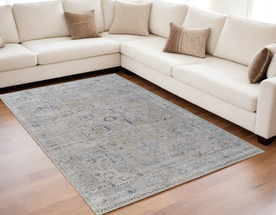 5" X 8" Ivory Taupe and Blue Oriental Power Loom Worn Faded Area Rug With Fringe