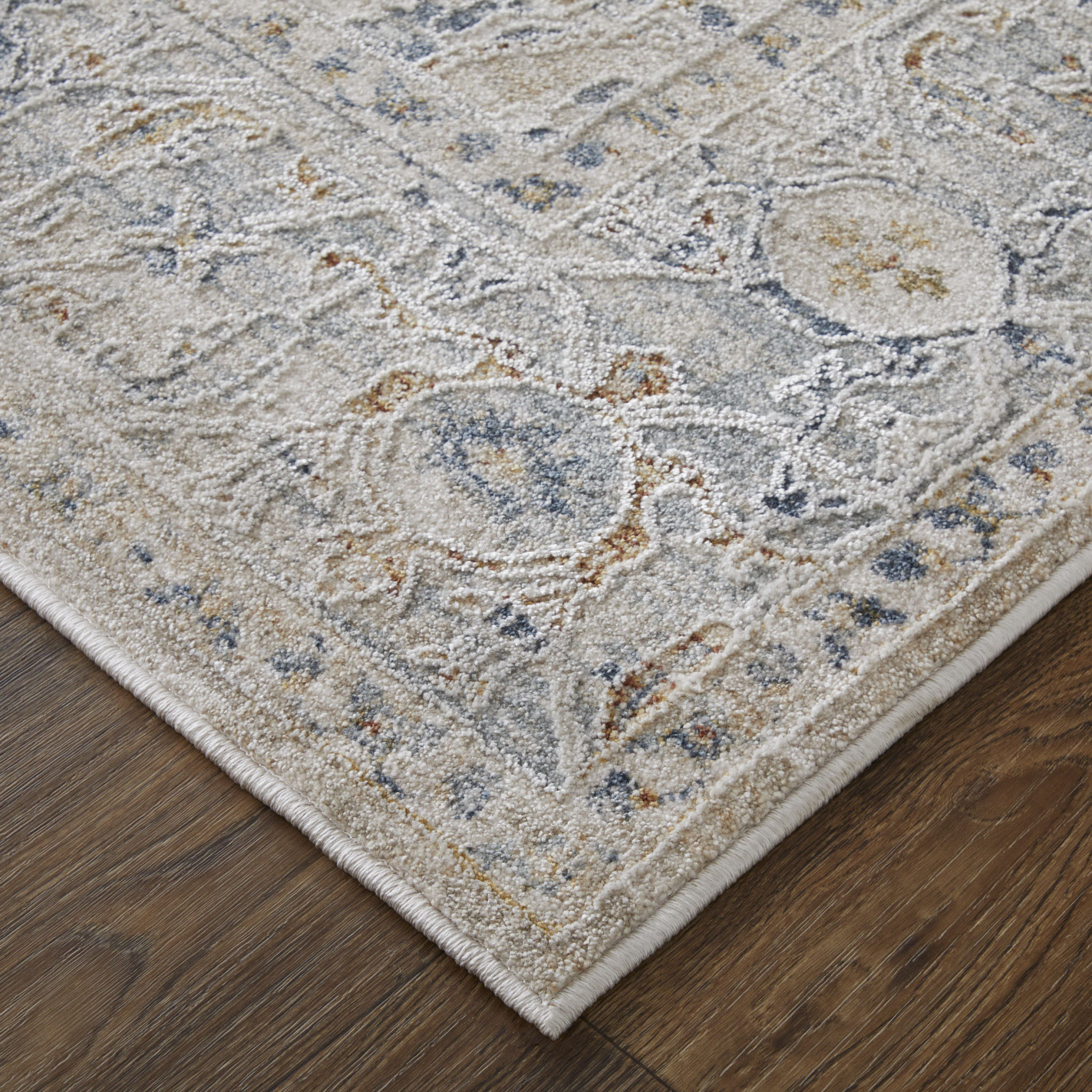 9" X 13" Ivory Taupe and Blue Oriental Power Loom Worn Faded Area Rug With Fringe