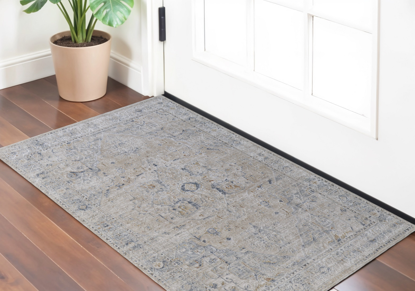 2" X 3" Ivory Taupe and Blue Oriental Power Loom Worn Faded Area Rug With Fringe
