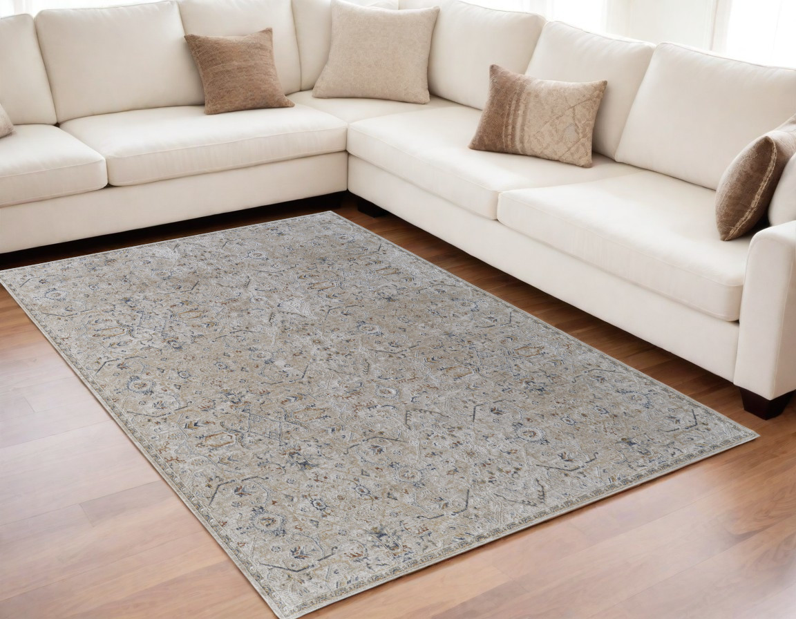 5" X 8" Ivory Taupe and Blue Abstract Power Loom Worn Faded Area Rug With Fringe