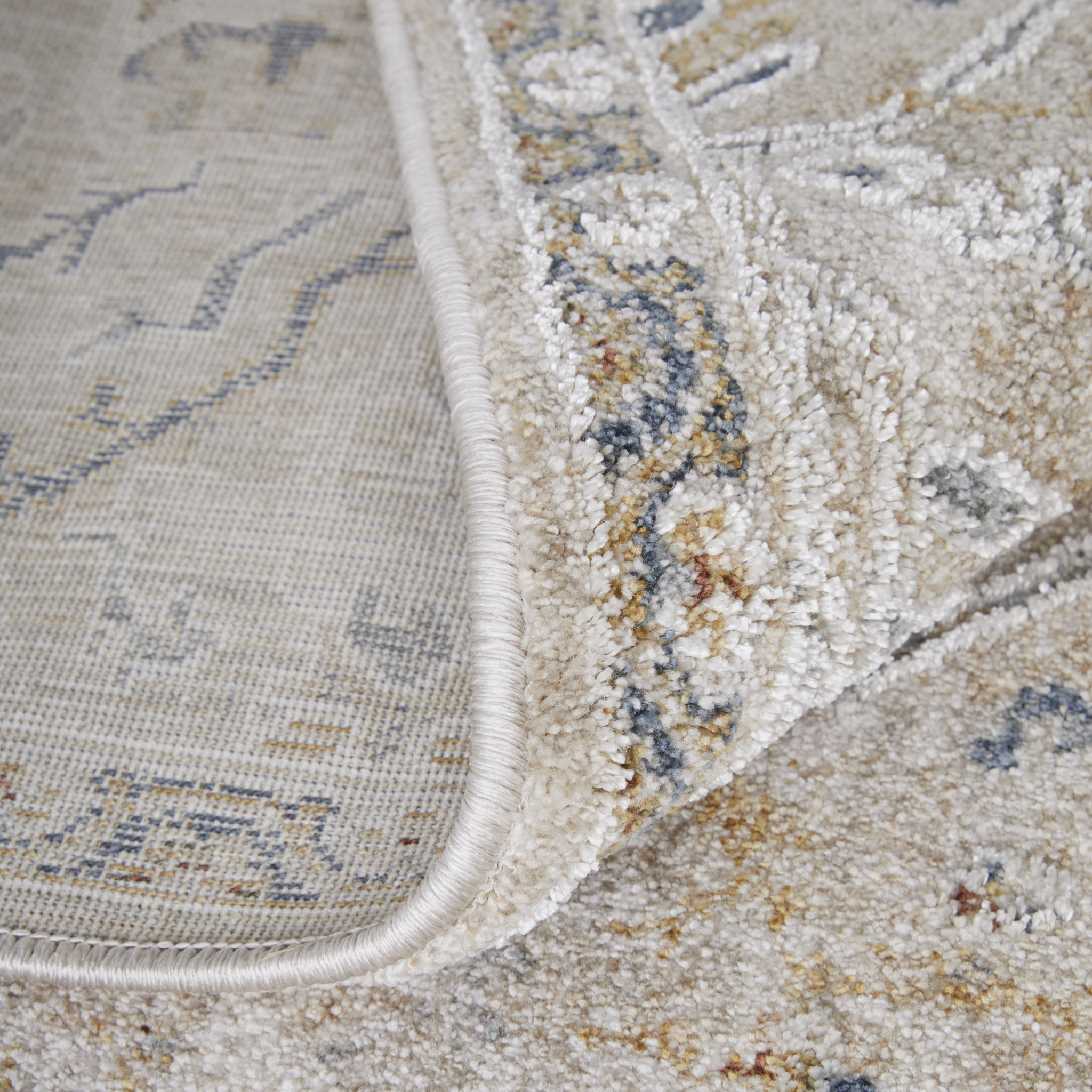7" X 10" Ivory Taupe and Blue Abstract Power Loom Worn Faded Area Rug With Fringe