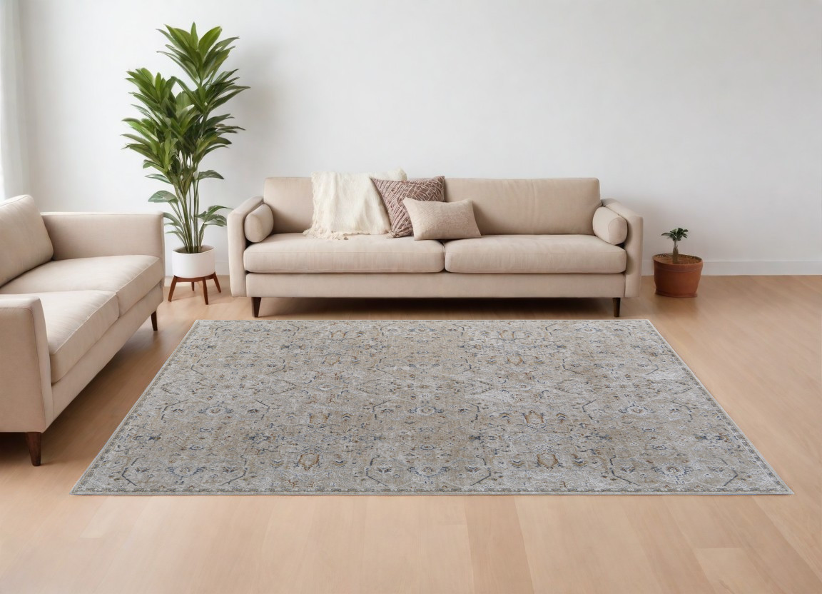 9" X 13" Ivory Taupe and Blue Abstract Power Loom Worn Faded Area Rug With Fringe