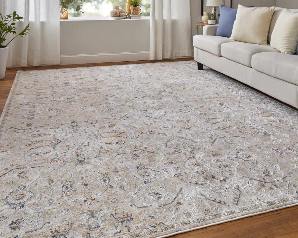 2" X 3" Ivory Taupe and Blue Abstract Power Loom Worn Faded Area Rug With Fringe