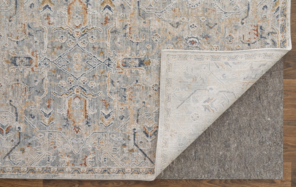 5" X 8" Ivory Tan and Blue Abstract Power Loom Worn Faded Area Rug With Fringe