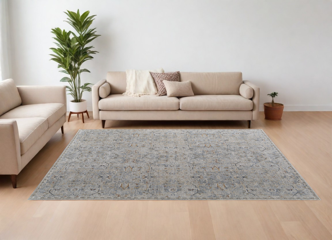 8" X 10" Ivory Tan and Blue Abstract Power Loom Worn Faded Area Rug With Fringe