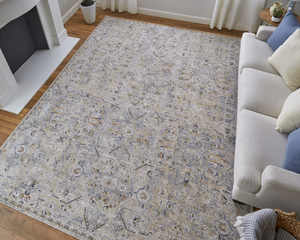 2" X 3" Ivory Tan and Blue Abstract Power Loom Worn Faded Area Rug With Fringe