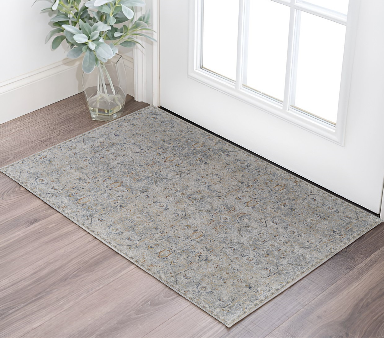 2" X 3" Ivory Tan and Blue Abstract Power Loom Worn Faded Area Rug With Fringe