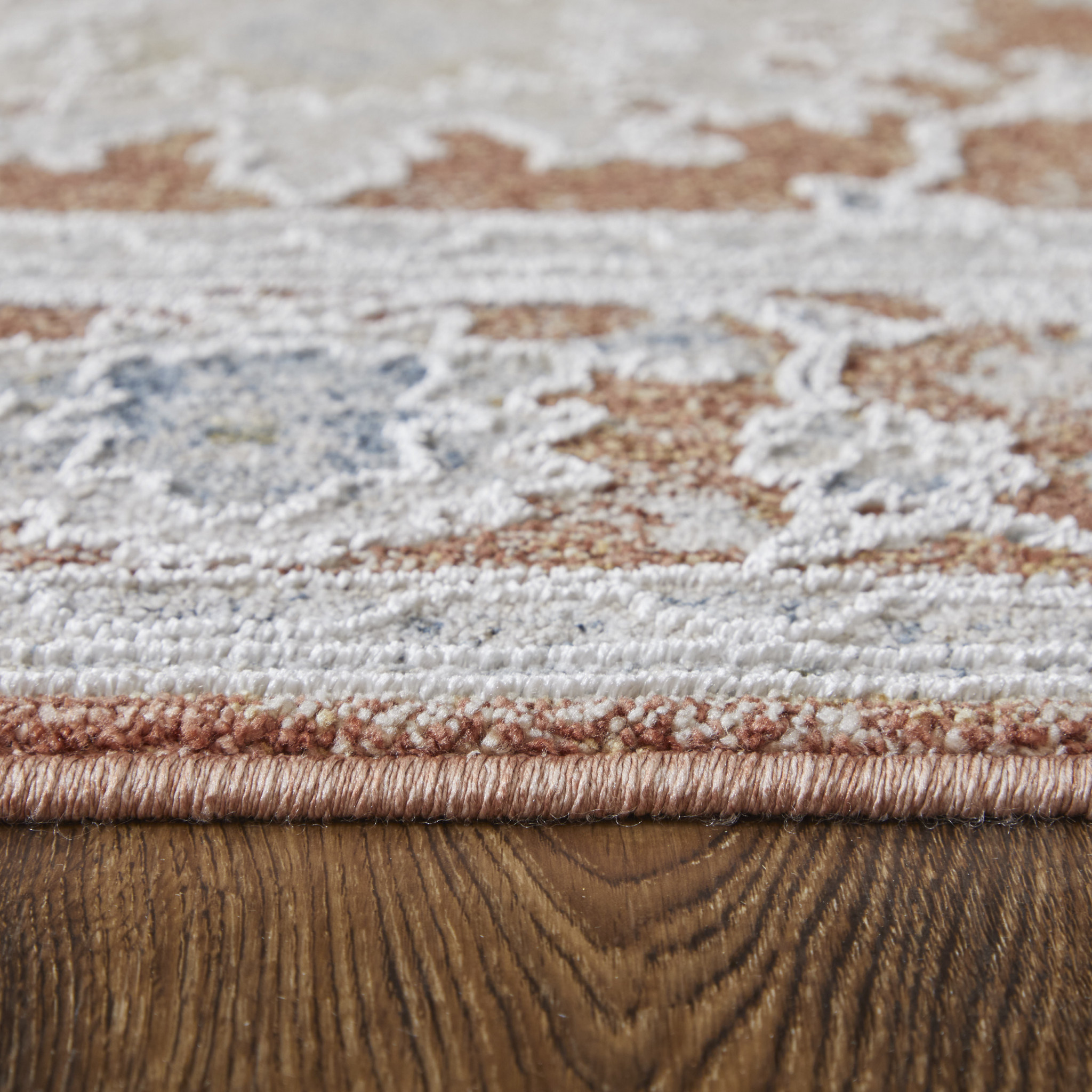 8" X 10" Red Blue and Ivory Floral Power Loom Worn Faded Area Rug With Fringe