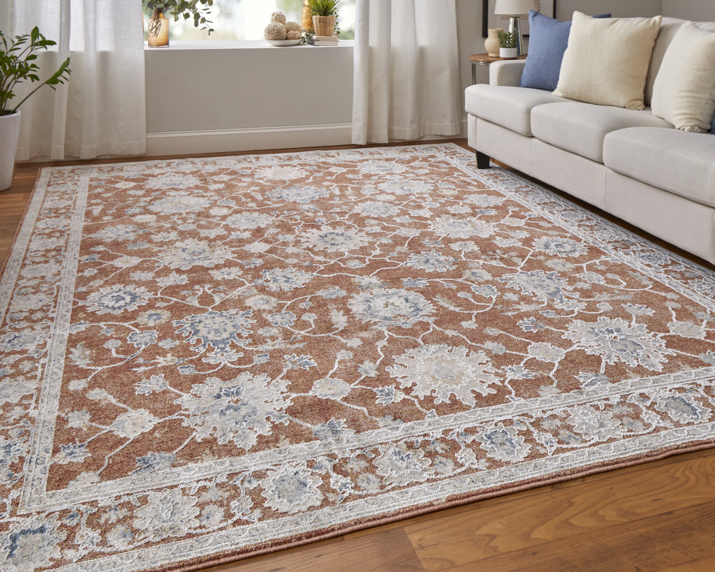2" X 3" Red Blue and Ivory Floral Power Loom Worn Faded Area Rug With Fringe