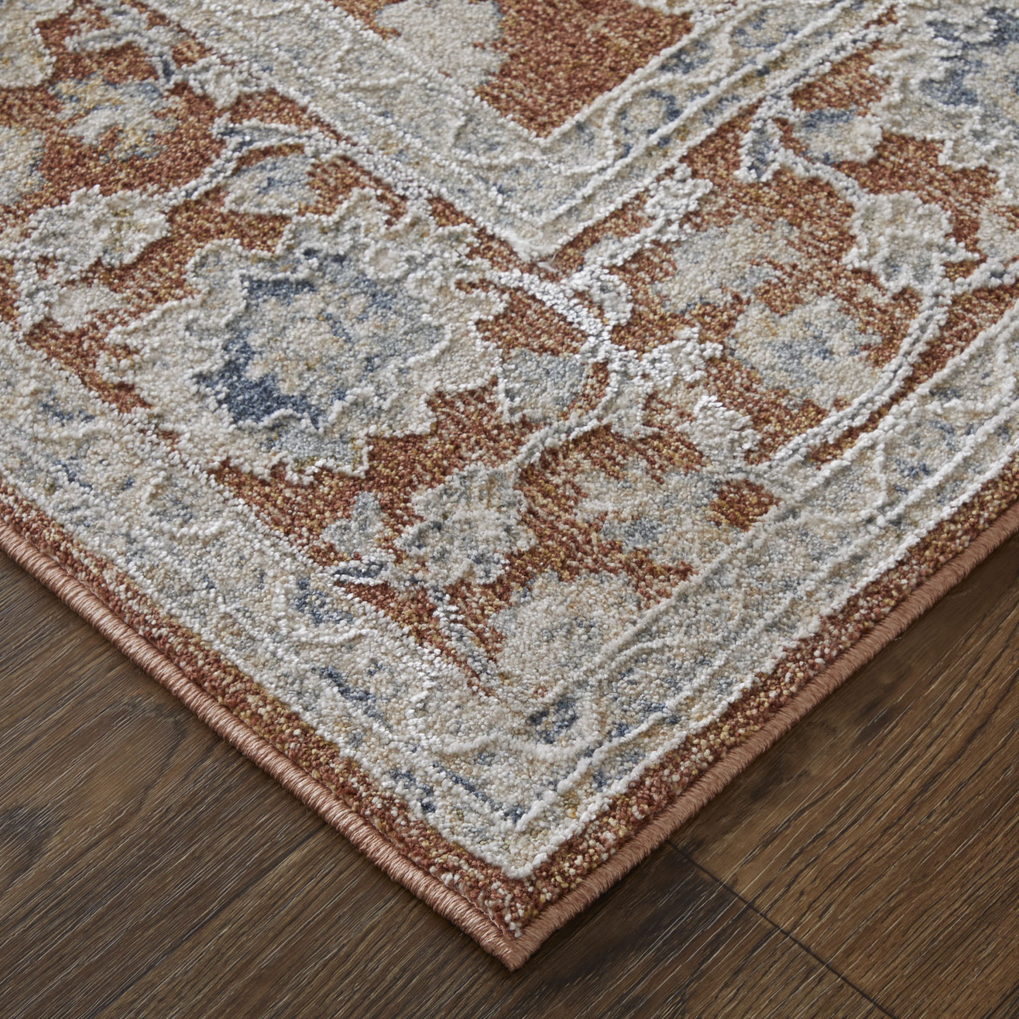 2" X 3" Red Blue and Ivory Floral Power Loom Worn Faded Area Rug With Fringe