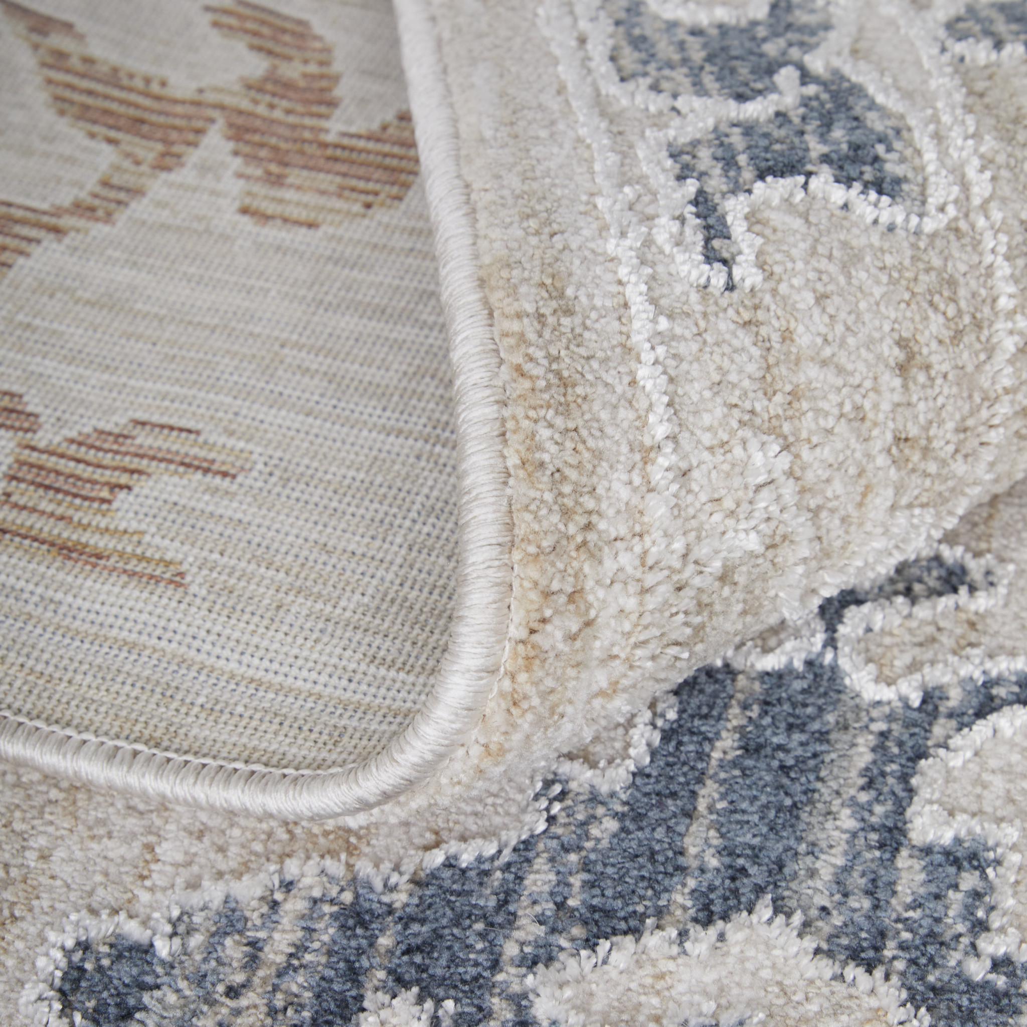 5" X 8" Ivory Blue and Gold Floral Power Loom Worn Faded Area Rug With Fringe