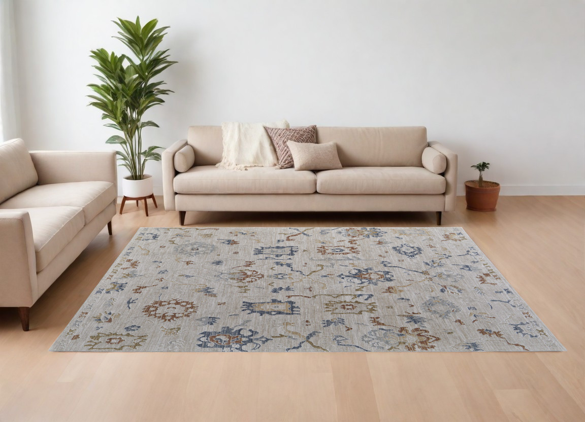 7" X 10" Ivory Blue and Gold Floral Power Loom Worn Faded Area Rug With Fringe