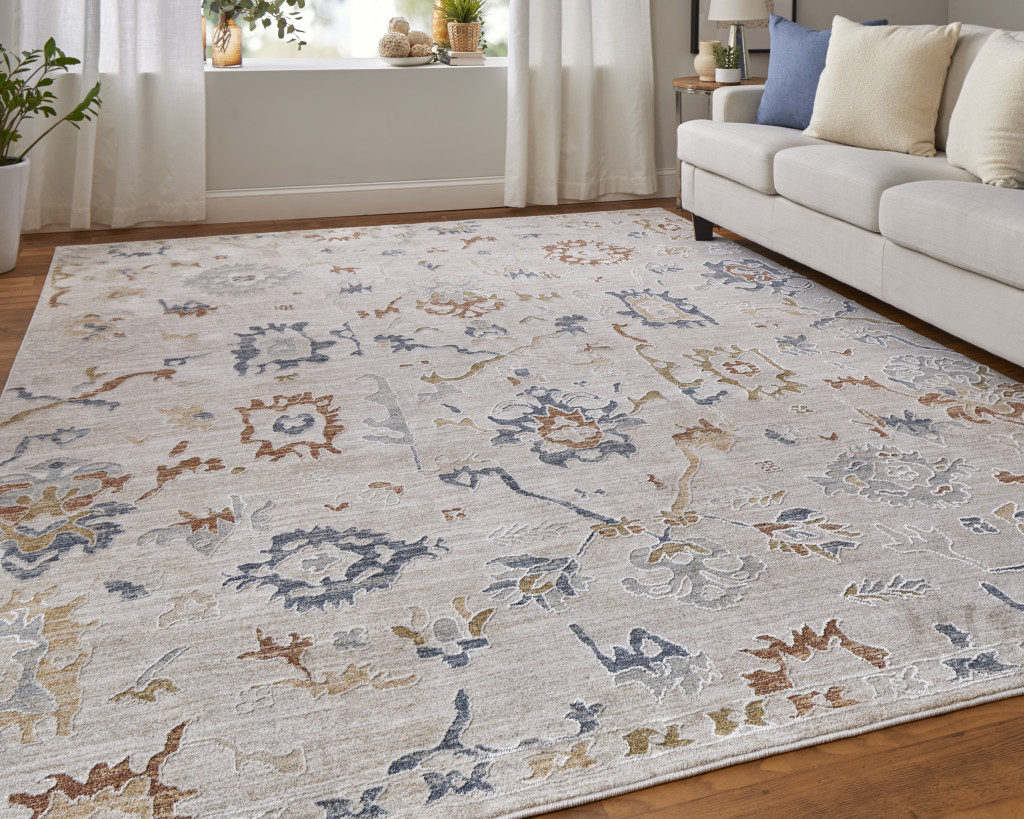 2" X 3" Ivory Blue and Gold Floral Power Loom Worn Faded Area Rug With Fringe