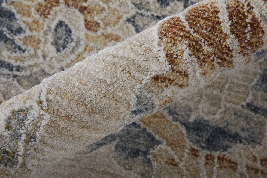 7" X 10" Ivory Taupe and Blue Floral Power Loom Worn Faded Area Rug With Fringe