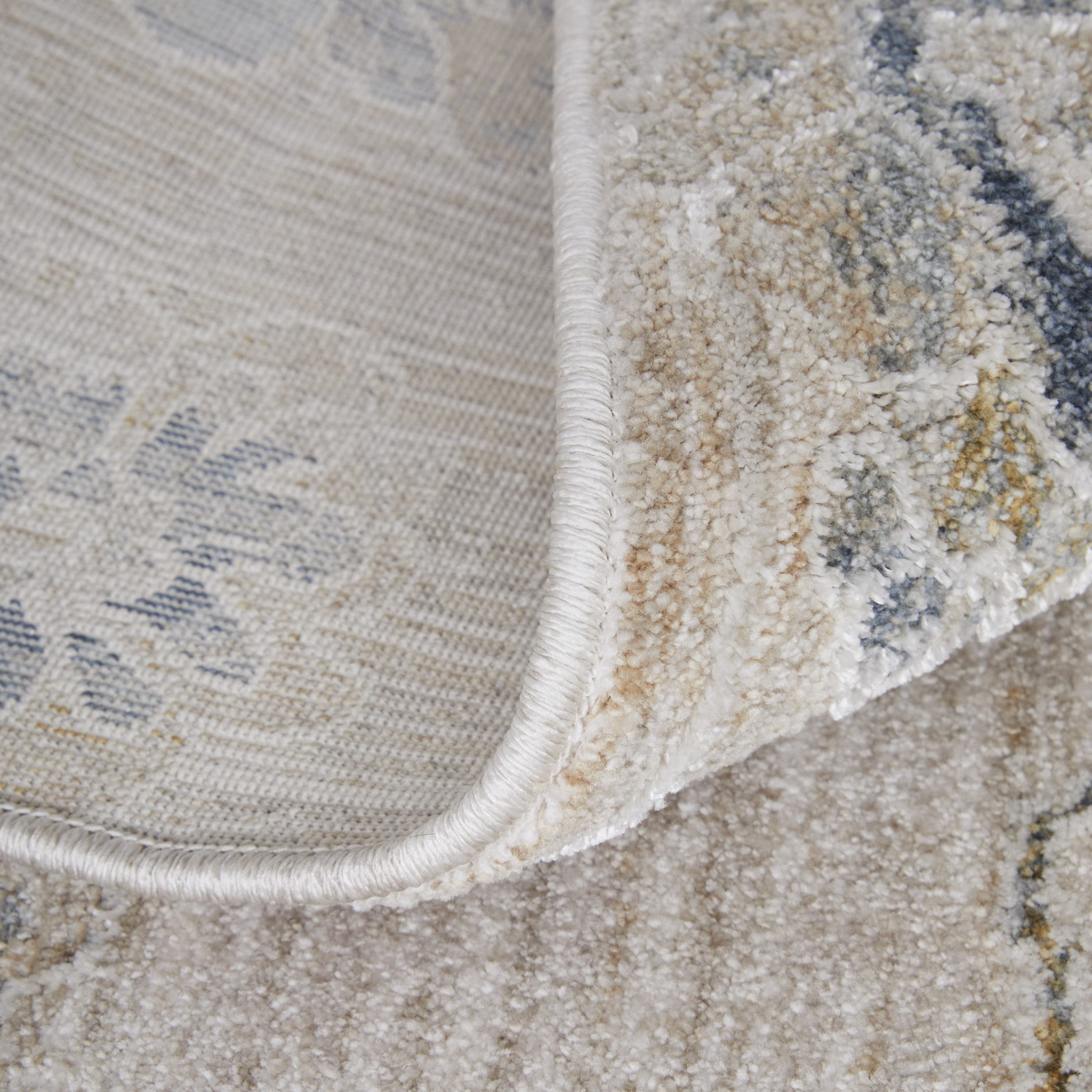 7" X 10" Ivory Taupe and Blue Floral Power Loom Worn Faded Area Rug With Fringe