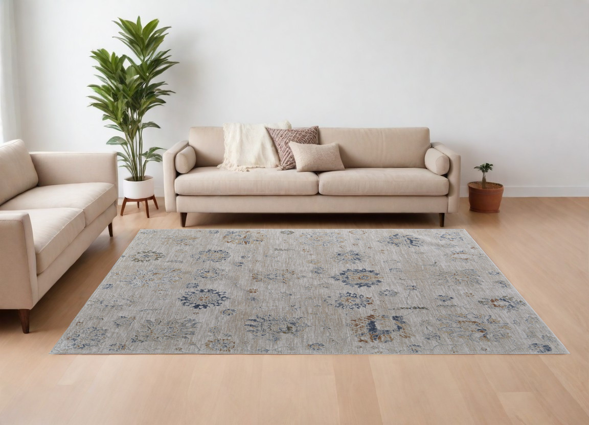 7" X 10" Ivory Taupe and Blue Floral Power Loom Worn Faded Area Rug With Fringe