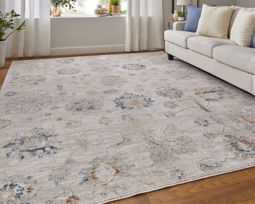 2" X 3" Ivory Taupe and Blue Floral Power Loom Worn Faded Area Rug With Fringe